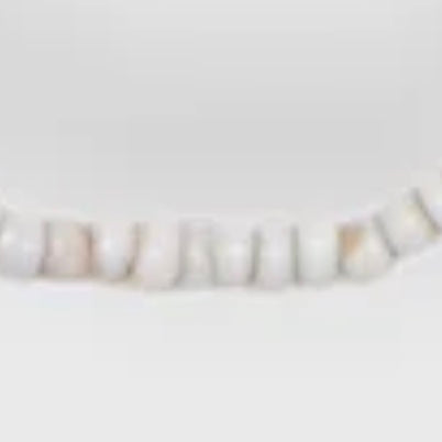 Tiny African Beads in Desert Sand