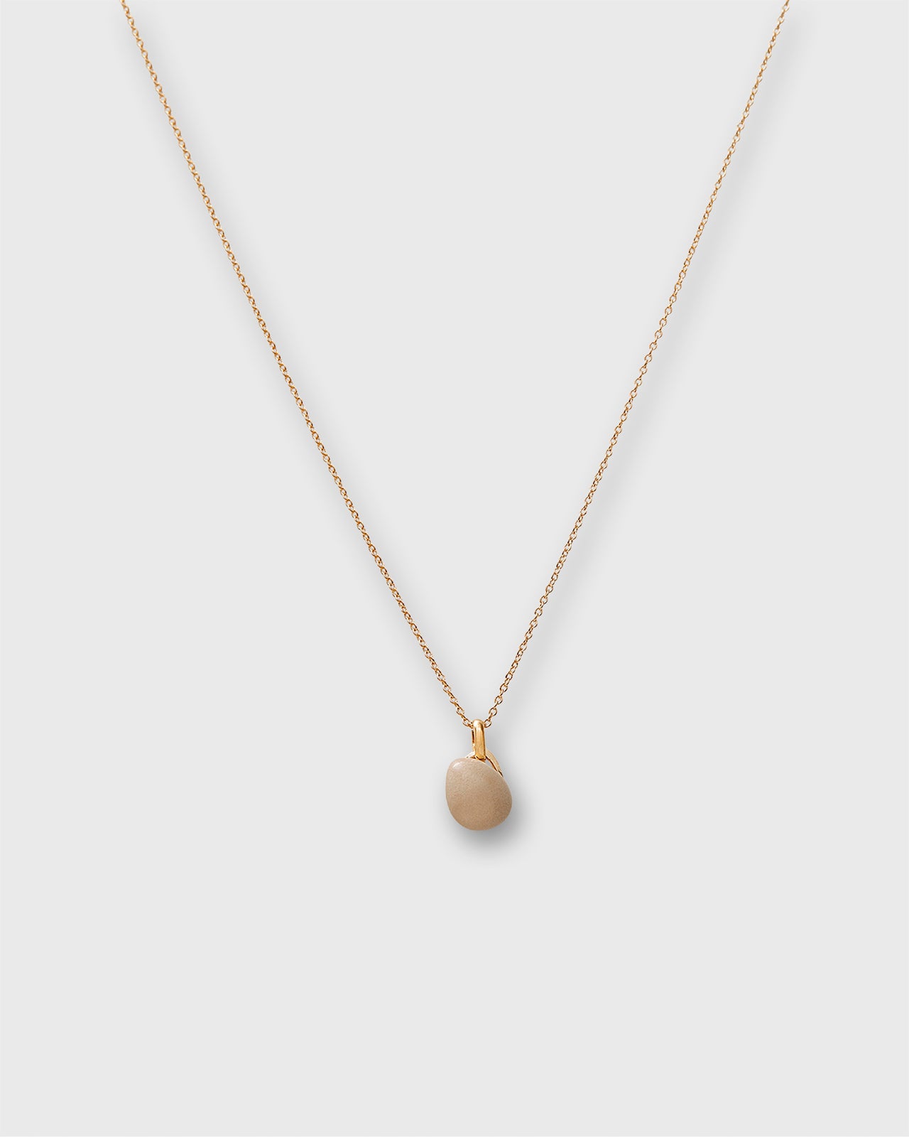 Tiny Ceramic Egg Pendant Necklace in Almond/Gold