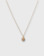 Load image into Gallery viewer, Tiny Ceramic Egg Pendant Necklace in Almond/Gold
