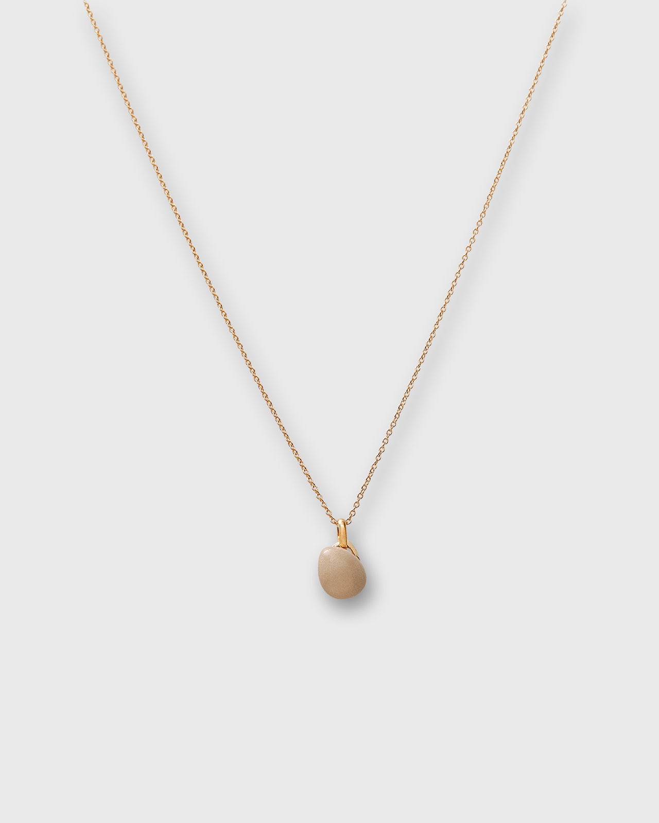 Tiny Ceramic Egg Pendant Necklace in Cream/Gold