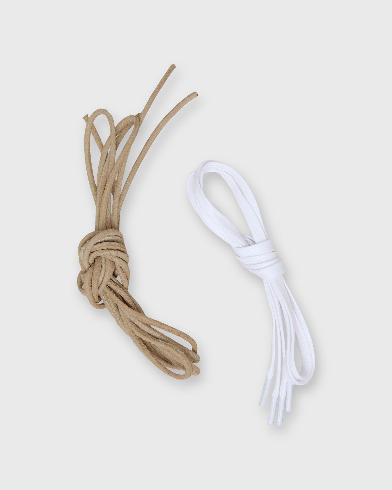 Low-Top Lace-Up Sneaker in White Perforated Leather