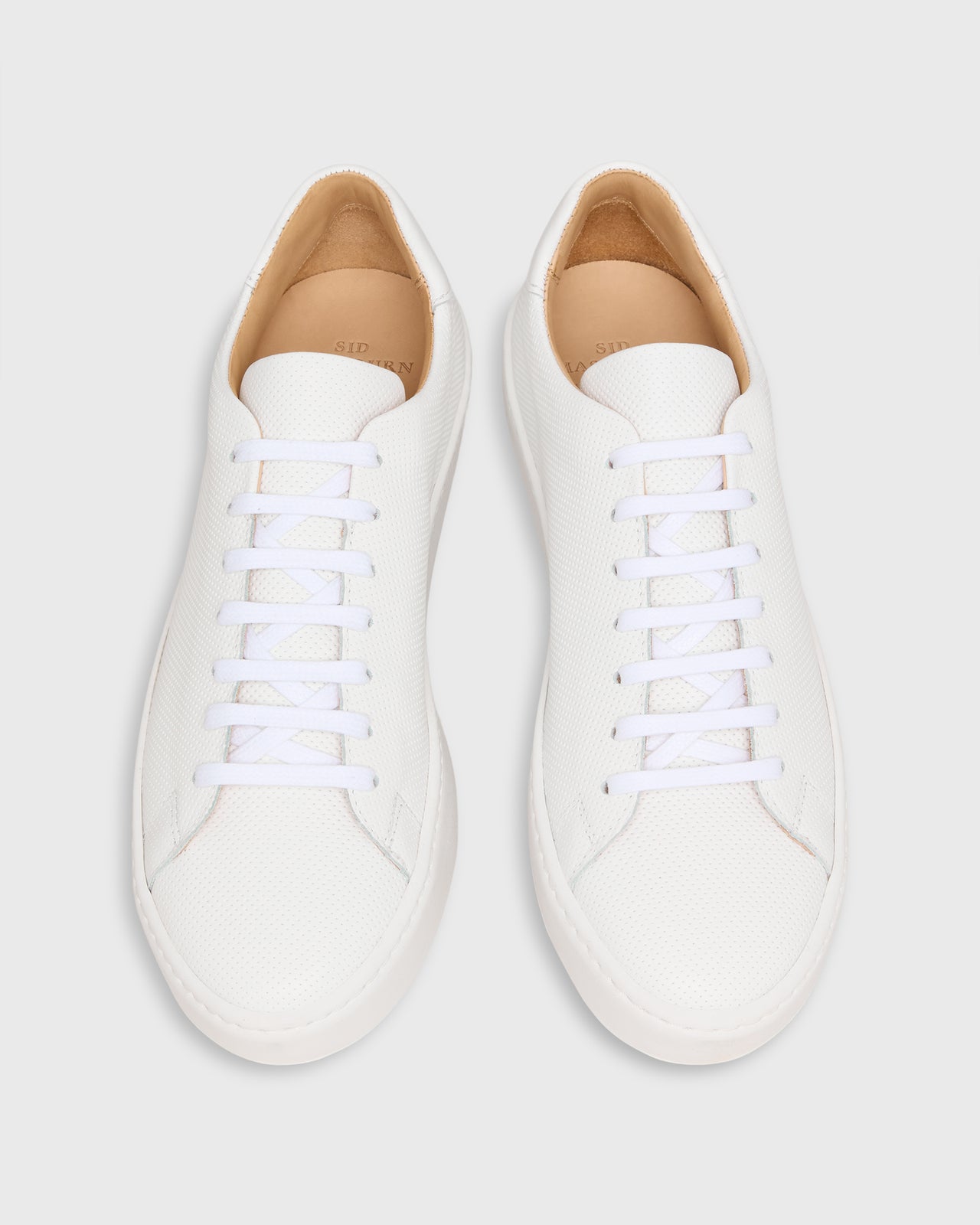 Low-Top Lace-Up Sneaker in White Perforated Leather