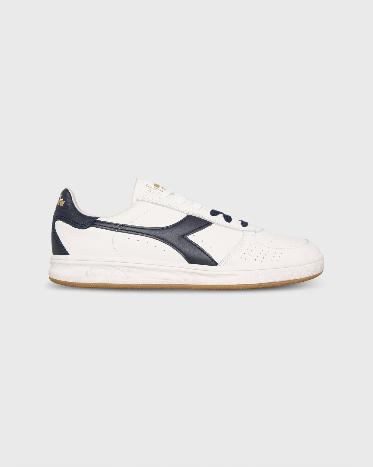 B. Elite Dominio Sneaker in White/Peacoat