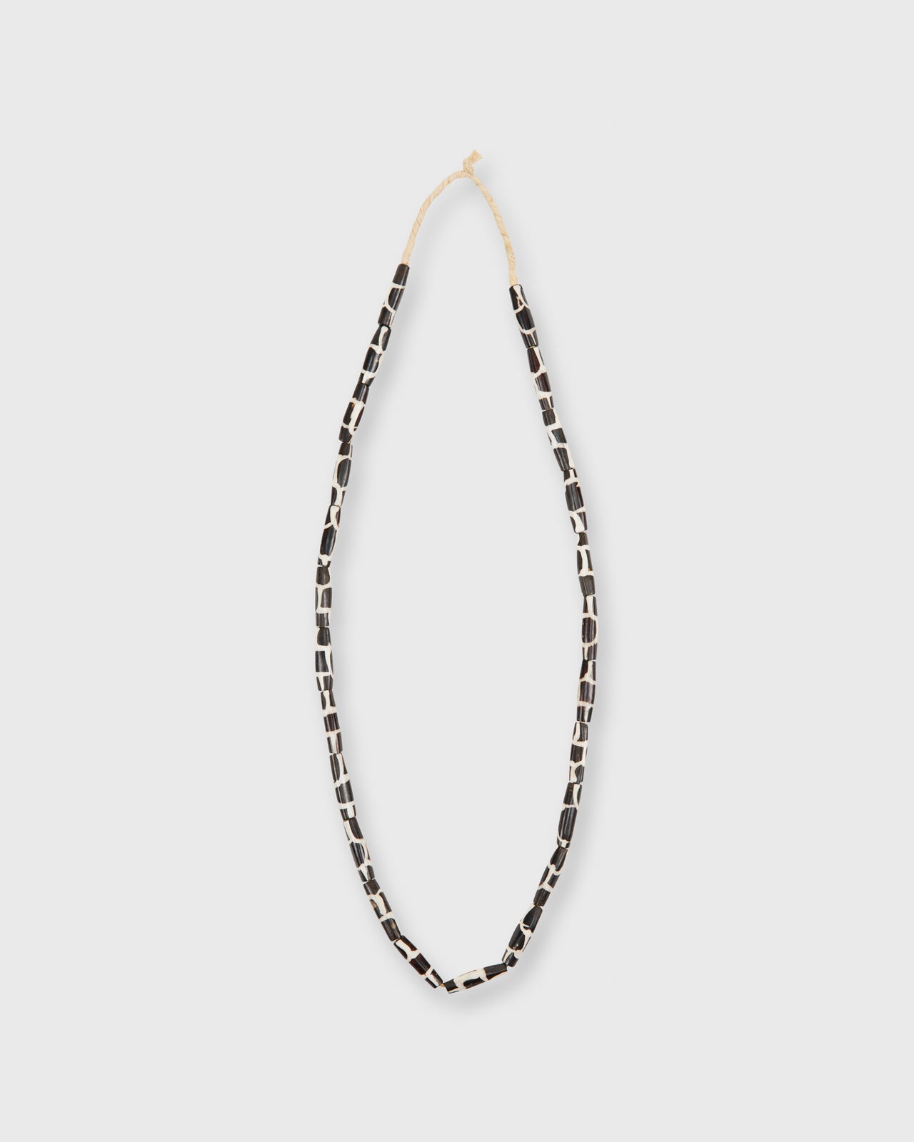Small Elongated Cowbone Beads Brown/White Giraffe