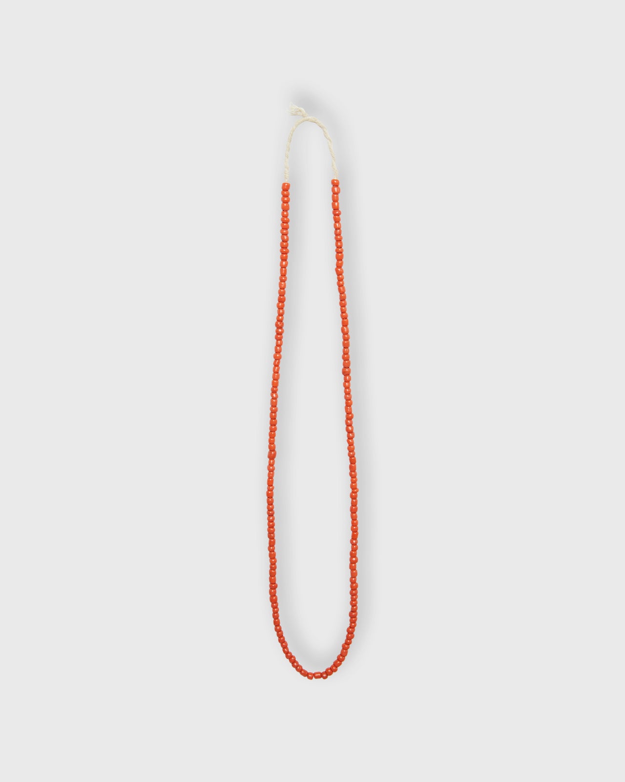 Very Small African Beads in Orange